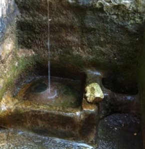 white spring water at glastonbury tor